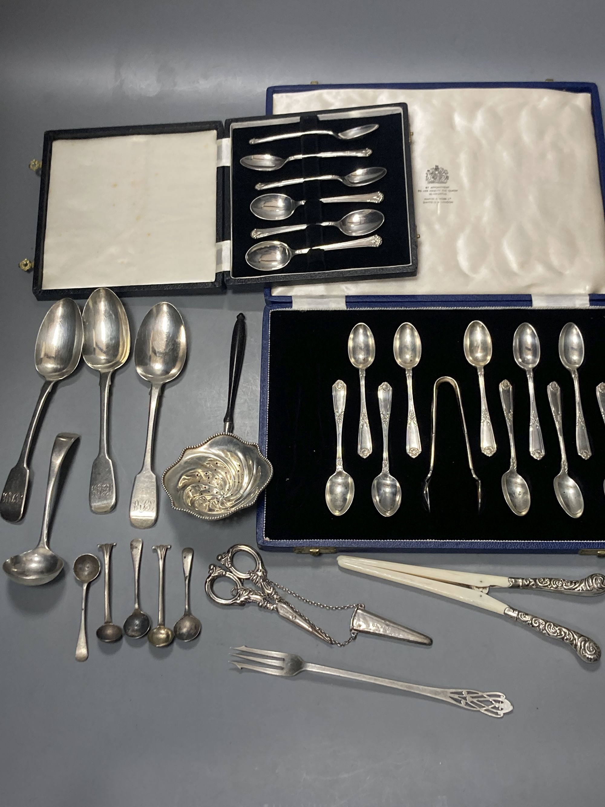 A cased set of six 1950s silver teaspoons, one other incomplete silver set and other flatware.